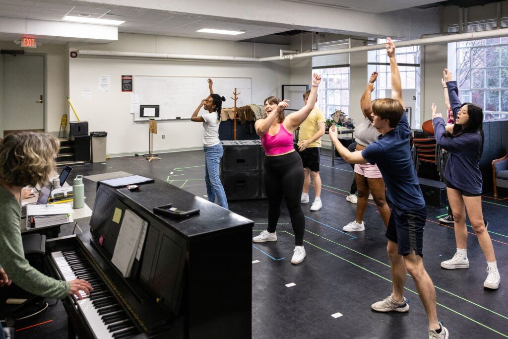 Actors from the UGA theatre department practice in a studio room for their performance of The Little Shop of Horrors.