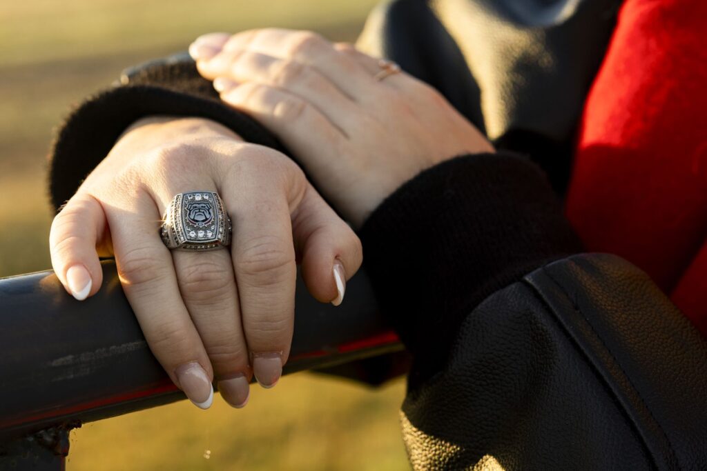 A closeup of an equestrian championship ring that Caitlin Lyons won for horseback riding.